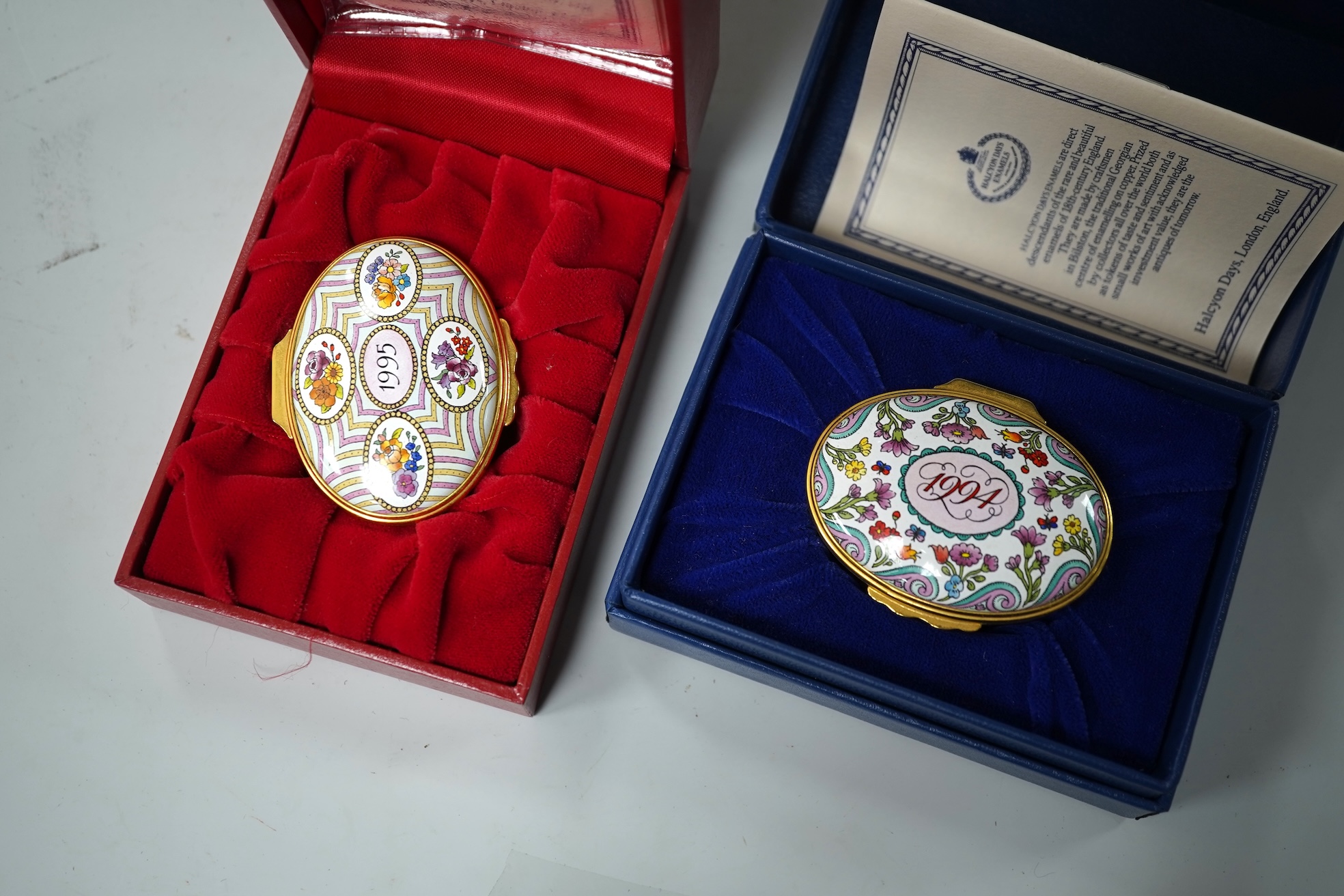 A collection of fourteen boxed Halcyon Days enamel trinket boxes, boxed